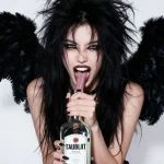 The flying whore licking a bottle of tequila